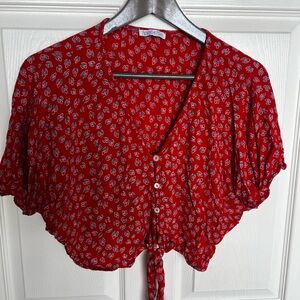 Red cropped top with tie and button details size small
